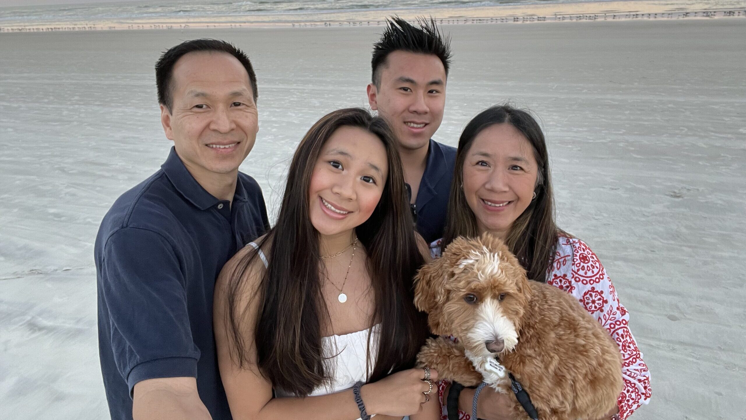 The Chin family with Max at the beach over Christmas 2021