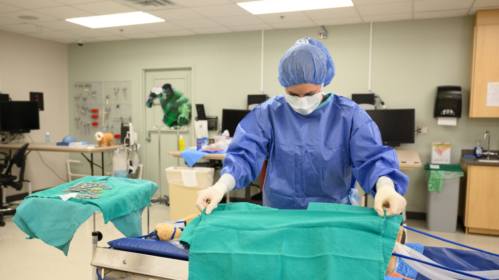 surgeon prepares surgery table